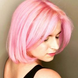 Author with pink hair