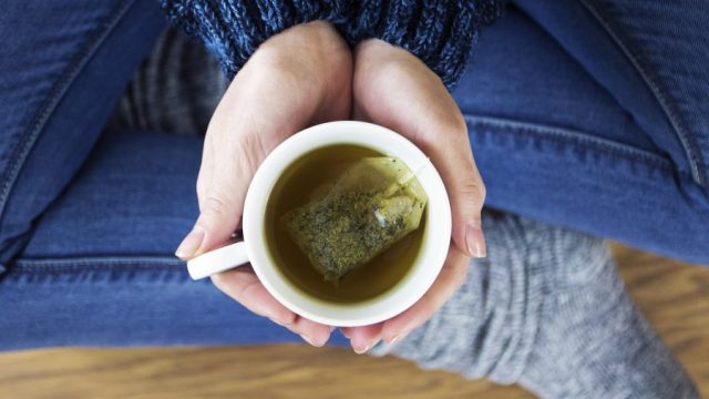 Woman having a cup of tea