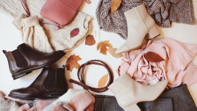 High Angle View Of Shoes And Sweaters On Floor
