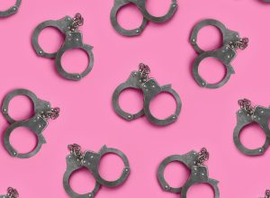 Collage of handcuffs on pink background