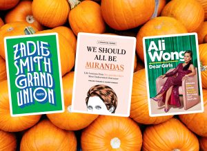 Three book covers against pumpkins