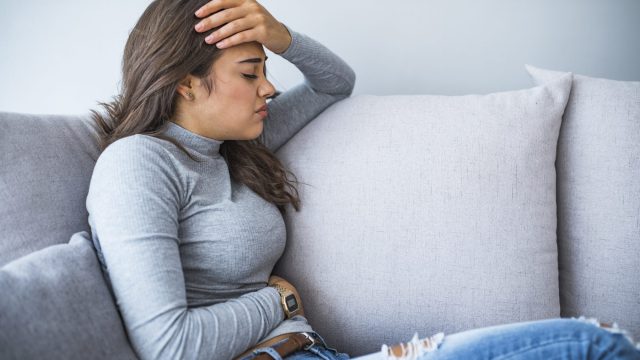 woman suffering gluten allergy symptoms
