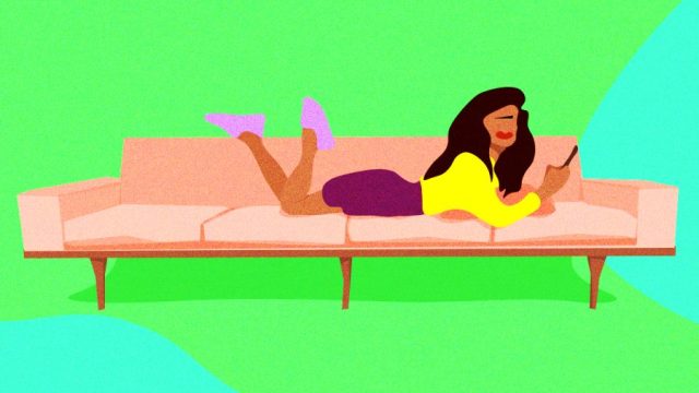 woman laying on the couch