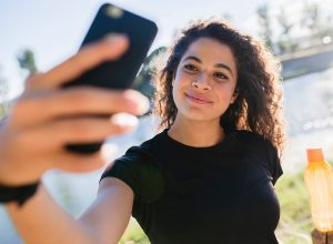 woman taking an instagram selfie