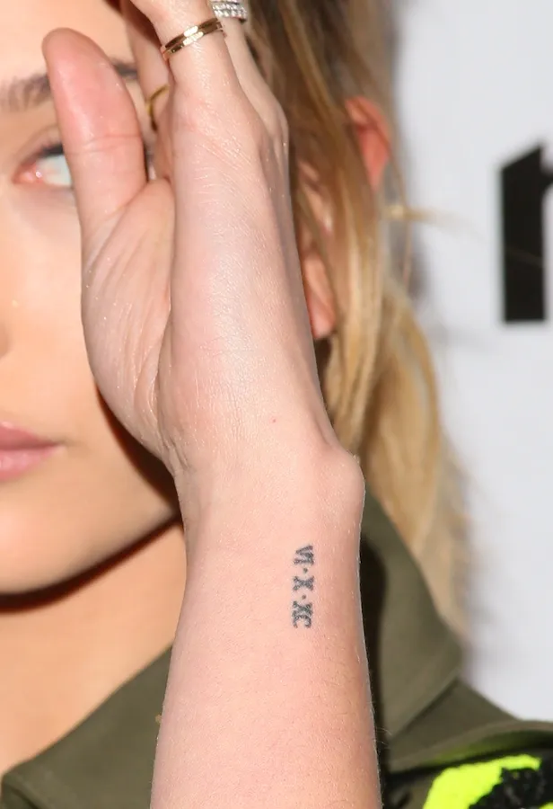 Hailey Bieber Opened Up About Her Most Meaningful Tiny TattooHelloGiggles