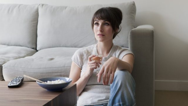 woman drinking alone