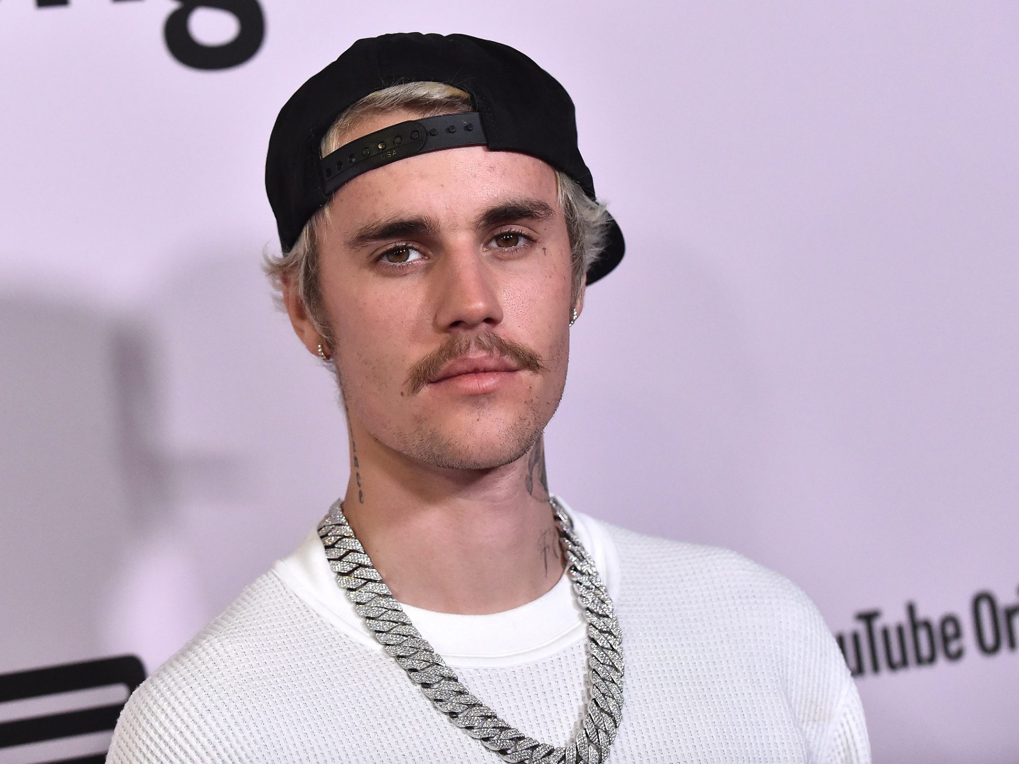 Pop Updates  Justin Bieber shows off new neck tattoo on  Facebook