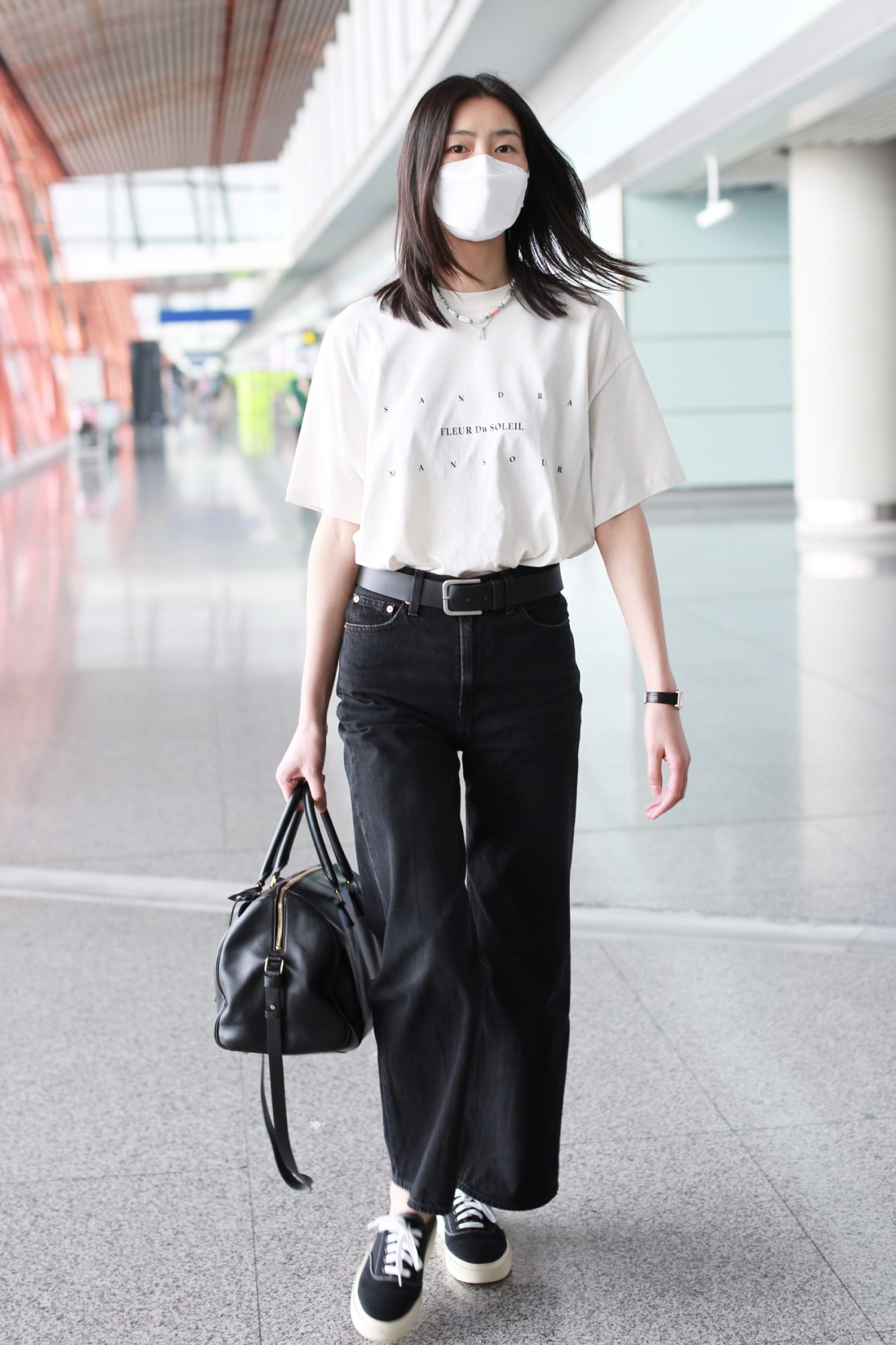 White top and deals black jeans