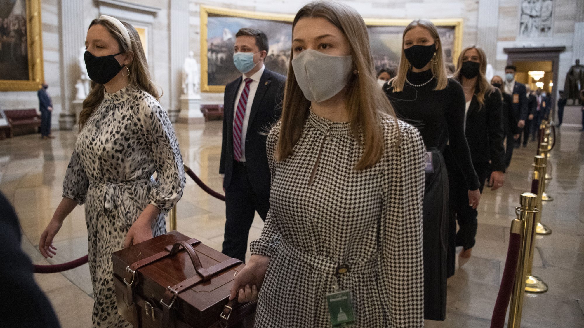 Senate aides carrying ballot boxes