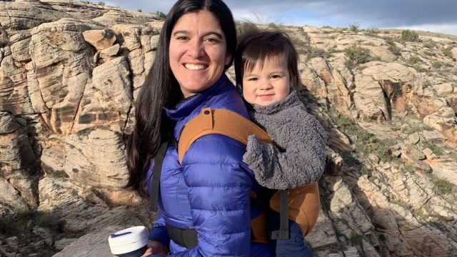 Alessandra Magaña-Hurt of @naturemamareads on a hike with child