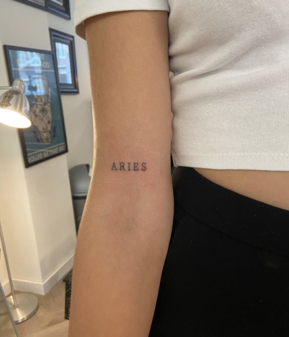 zodiac sign circle tattoo