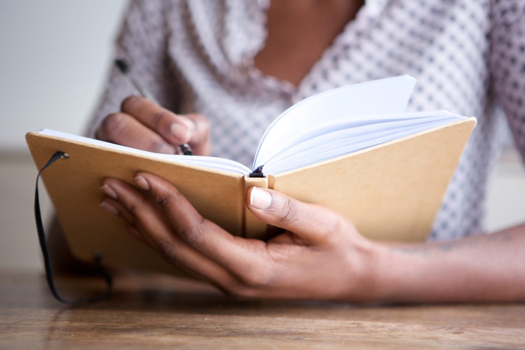 Woman With Journal