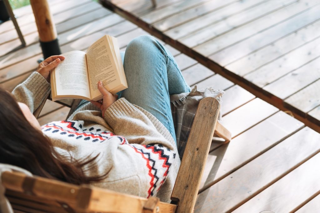 Woman Reading Glamping