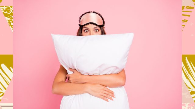 Scary dream woman holding pillow nightmare sleep 1