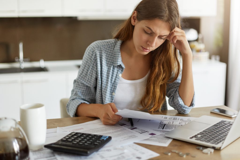 Woman paying bills