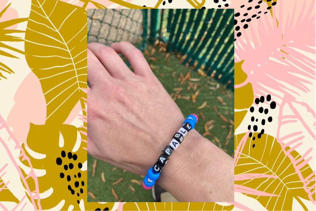 Writer’s bracelet spelling out Capable