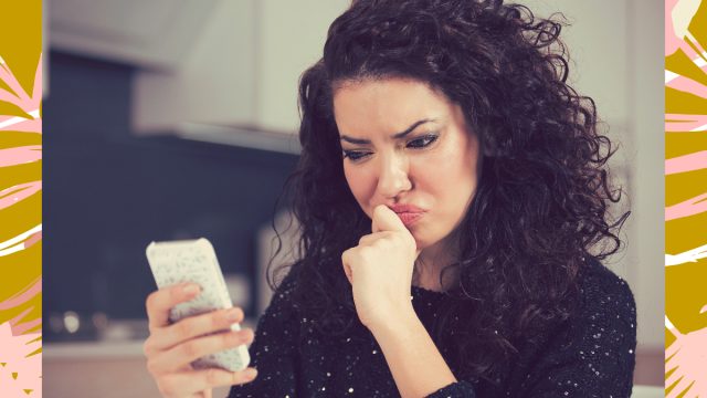 woman on phone confused using dating app