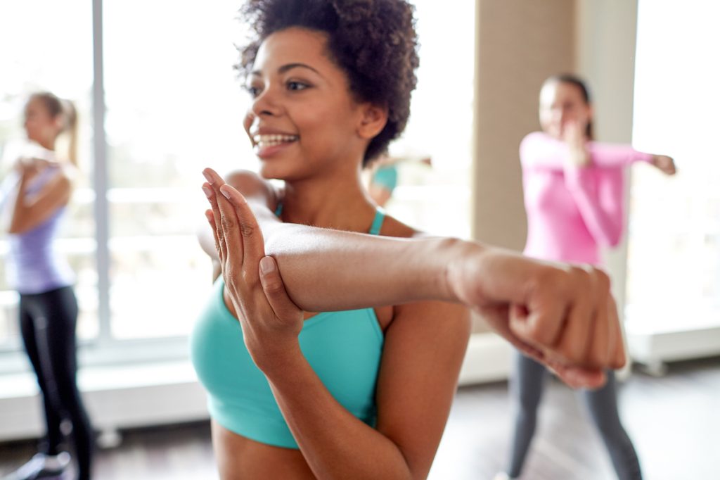 woman smiling exercise class