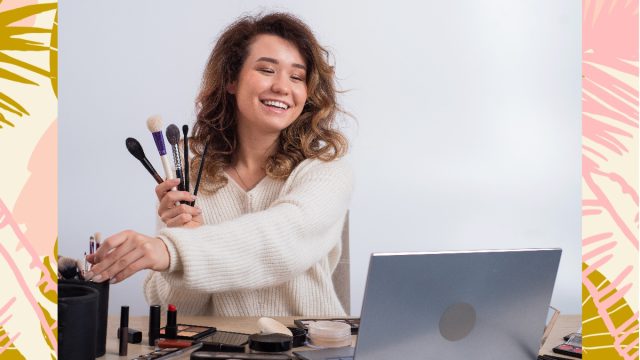 Woman putting on makeup