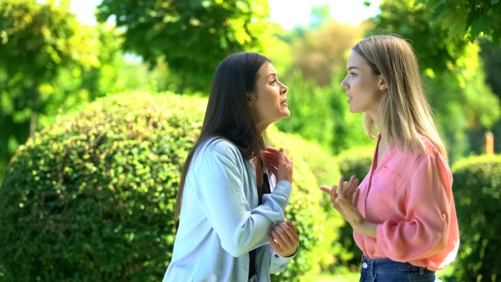 Women Friends Arguing Outside