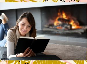 Woman reading by fire