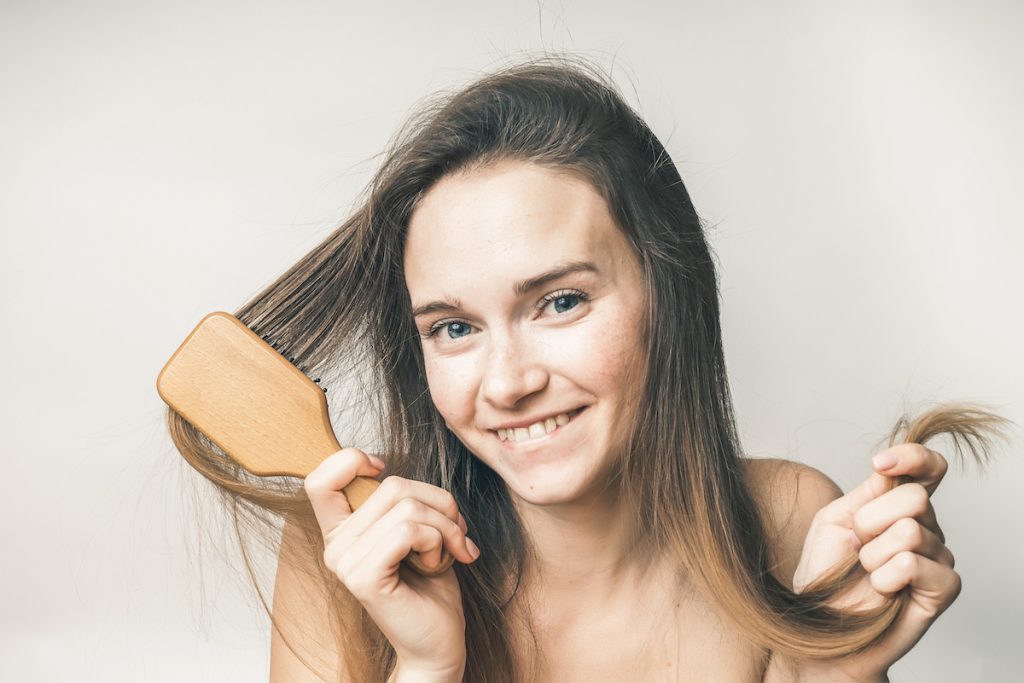 woman brushing hair