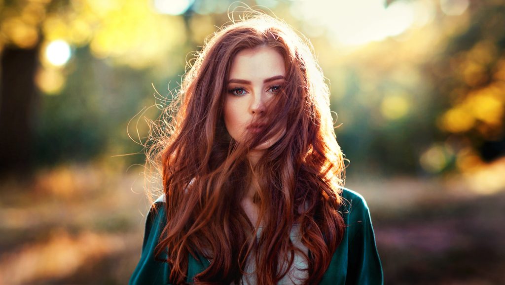 https://hellogiggles.com/wp-content/uploads/sites/7/2022/11/woman-fall-red-hair.jpg?quality=82&strip=all&w=1024