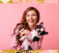 woman happy with dog