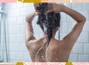 woman washing hair in the shower
