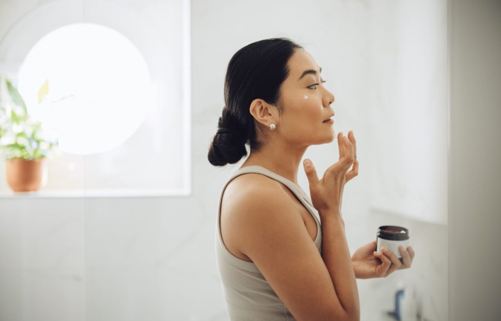 woman using skincare