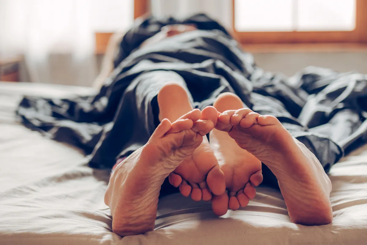 feet in bed
