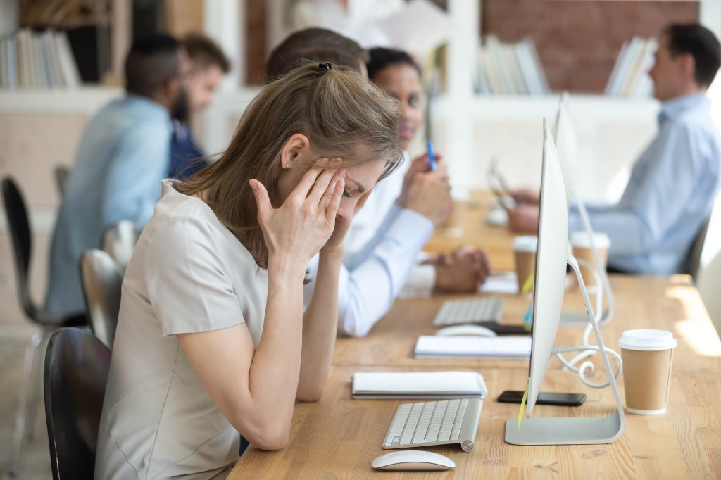 Woman Overwhelmed at Work